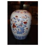 Porcelain ginger jar decorated with flowers (chip