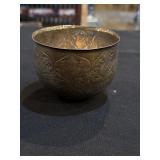 Antique Persian bowl featuring intricate hammered