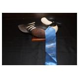 Drake hooded merganser with tucked head carving