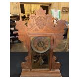 Oak encased mantel clock