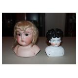 2 Doll heads - bisque one marked Germany other