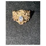Filigree ring with blue/purple gem stone