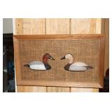 Wall plaque of half canvasback drake and hen by
