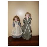 2 Antique bisque face dolls - 1 possibly marked