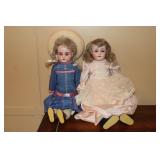 2 Bisque face dolls - eyes open & close, 1 marked