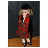 Antique doll with bisque head possibly German