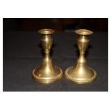 Antique brass push-up candlesticks