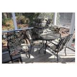 Round metal patio table, 4 arm chairs and 8