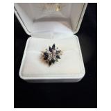 Ring with blue and clear gem stones