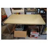 Folding table 48" x 24" x 28" H (contents on top