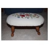 Footstool with floral needlepoint cover