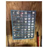 Parts bin mounted to wall and contents (buyer