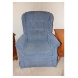 Blue upholstered rocking recliner