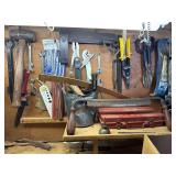 Tools on wall - snips, drill bits, small maul,