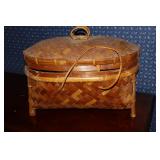 Asian style lidded basket with bamboo feet