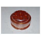 Marigold carnival glass flower frog (chipped)