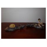 Pair of Water Buffalo mudmen figurines