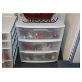 Plastic 3 drawer storage unit with contents -