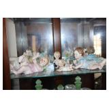 Shelf lot - 4 piano babies