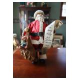 Possible Dreams Clothtique Santa checking his