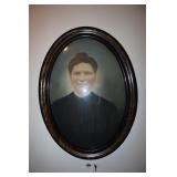 Convex glass & oval faux tiger style wood frame