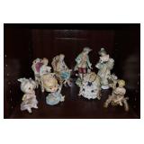 Shelf lot of porcelain figurines (couple chips)