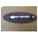 Carvel Hall duck handle knife on wood plaque