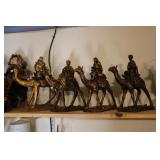 Lot - 4 Resign wisemen on camel figurines