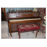 Wurlitzer upright piano, stool and sheet music