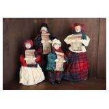 Lot - 4 Kurt Adler paper mache Carolers (2 women