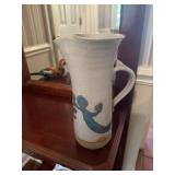 Southwestern style glazed pottery pitcher with