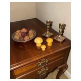 Alabaster mushrooms, brass candlesticks, a
