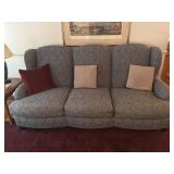 Blue/gray patterned sofa by Carol Hicks Bolton