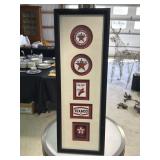 Framed collection of Texaco fuel product emblems