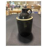 Small brown glazed stoneware pottery jug
