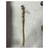 Walking stick with raccoon top and antler handle