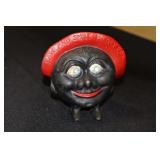Black Americana cast iron coin bank marked Save