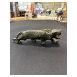 Hand carved lion figurine made in Kenya