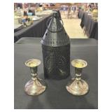 Pair of Colonial Trust silver tone candleholders,