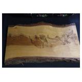 Live edge wood plaque featuring a wood burning of