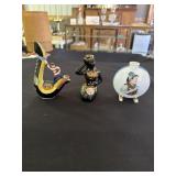 3 Flasks - Luxardo Nubian woman holding basket and