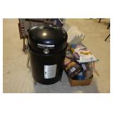 Brickmann Smoke N Grill and box of charcoal