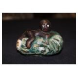Black Americana cast iron coin bank