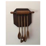 Wooden hanging kitchen utensils