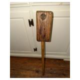 Old handmade wooden mallet or masher