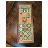 Framed display of Girl Scout badges from