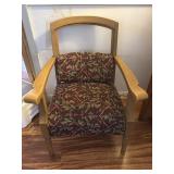2 Wooden arm chairs with patterned upholstery