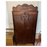 Antique armoire with ornate carvings 36 X