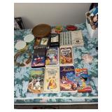 Disney VHS tapes, Beatrix Potter books, puzzle,