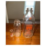 2 Koontz milk bottles one is 1QT and one is half